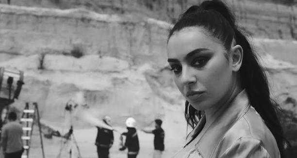 Charli XCX in a still from the "Camera" official music video.